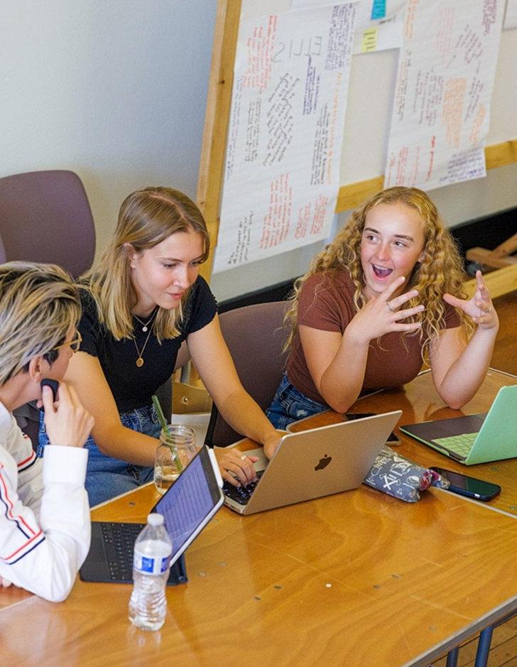 Students talk during a class at CASA Pitzer